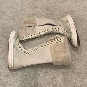 Converse Chuck Taylor’s. Knee high w/soft faux fur
